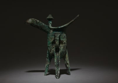 A Bronze Tripod Wine Vessel