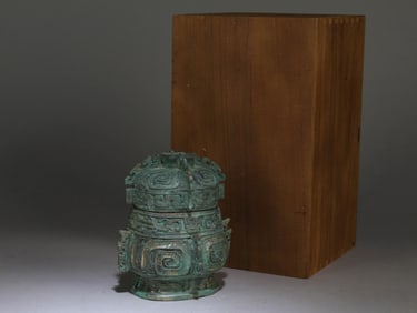 A Chinese Bronze Container With Lid