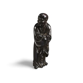 A Carved Hardwood Statue