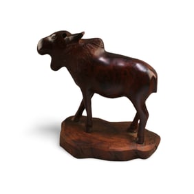 A Carved Wooden Animal Figurine