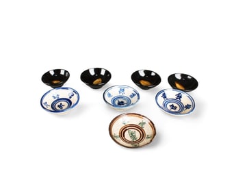 A Group of Eight Porcelain Saucers