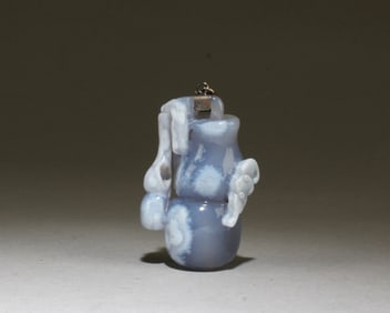 A Carved Agate Pandant