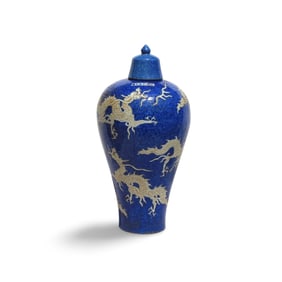A Blue and White Dragon Vase with Lid