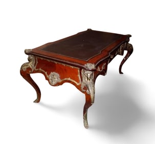 A Hardwood Table with Bronze Accents