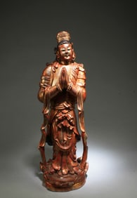 A Carved Wooden Standing Guanyin Statue