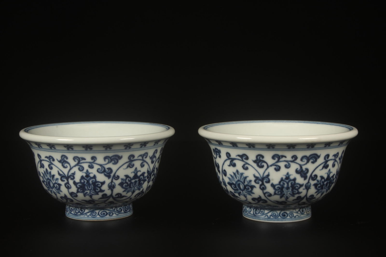 A Pair of Blue and White Cups: A Pair of Blue and White Cups. Height: 2.2in Diameter: 3.7in.
