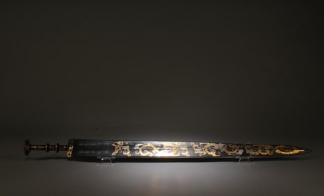 A Bronze Ornament with Gold Accents