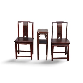 A Set of Two Wooden Chairs and One Table