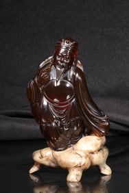 An Amber Caishen Ornament with Shoushan Stand