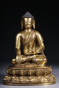 A Gilt Bronze Acala Seated Buddha Statue