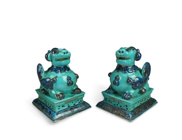 A Pair of Porcelain Mythical Beast Figurines