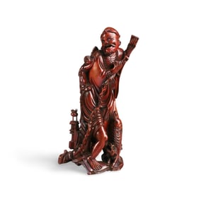 A Carved Wooden Figurine