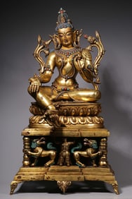 A Gilt Bronze Statue of Green Tara