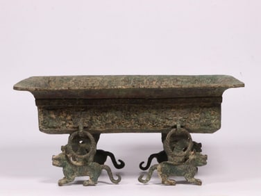 A Bronze Fruit Dish with Tiger Leg Design