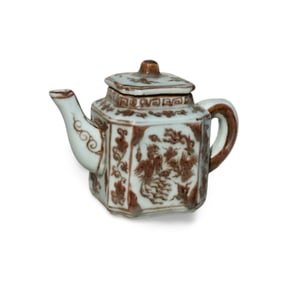 An Iron-Red Teapot with Lid