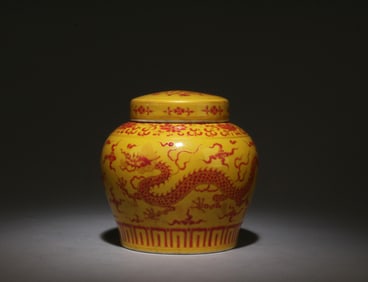 A Yellow and Red Jar with Lid