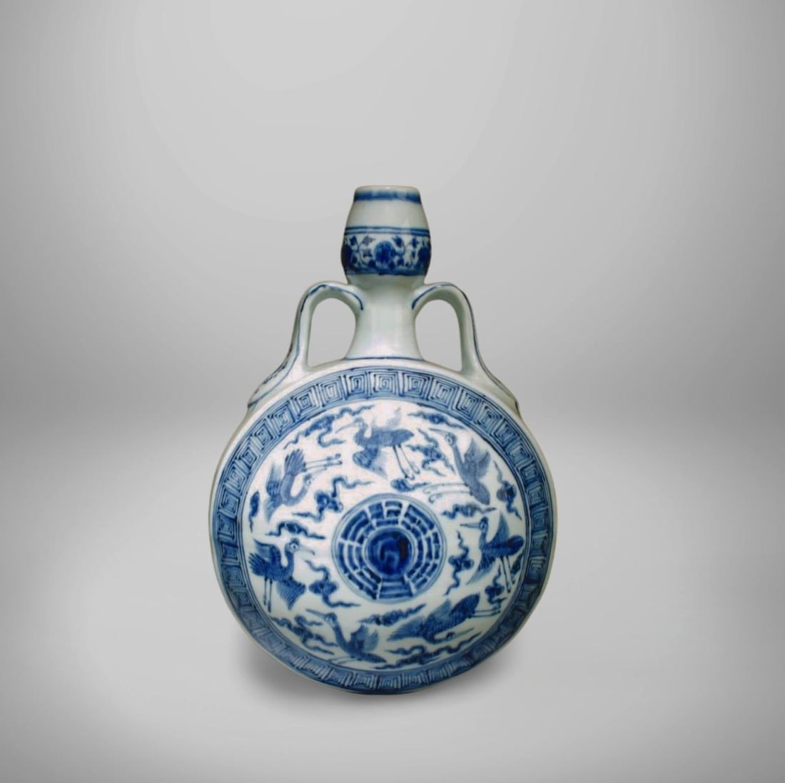 A Blue and White Moonflask Vase: A Blue and White Moonflask Vase. Dimension: 13" x 8.5".