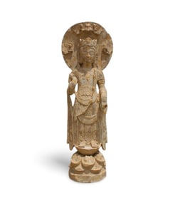A Carved Stone Standing Buddha Statue