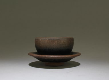 A Junyao Connected Cup and Saucer