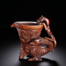 An Agarwood Cup Carved with Dragon Motif
