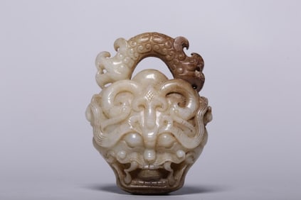 A Hetian Jade Ornament with Taotie Motif