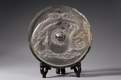 A Bronze Mirror with Dragon and Phoenix Motif