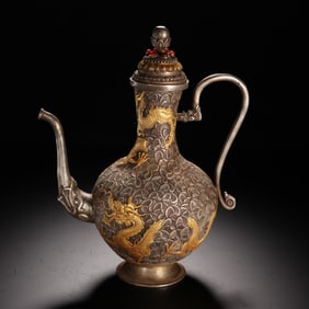 A Gilt Silver Wine Ewer with Sea Creature and Dragon Motif