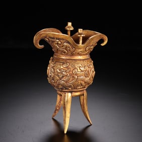 A Gilt Bronze Stem Cup with Dragon Motif