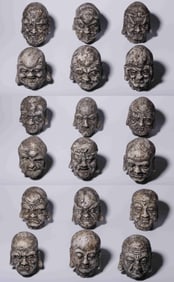 A Group of Ceramic Arhat Head Ornaments