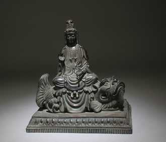 A Bronze Guanyin Sitting Statue