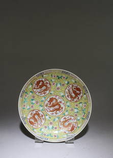 A Chinese Famille Jaune Dish: A Chinese Famille Jaune Dish. With "Tong Zhi" mark at base. Diameter: 6.75"