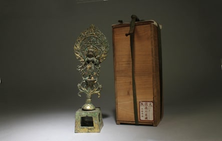 A Gilt Bronze Standing Buddha Statue