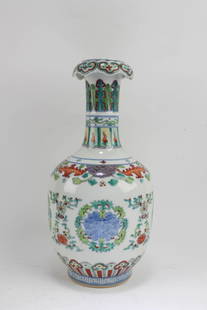 Chinese Porcelain Vase: Chinese Porcelain Vase. 'QianLong' mark at base. Height: 12"