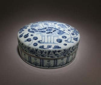 A Blue & White Round Container