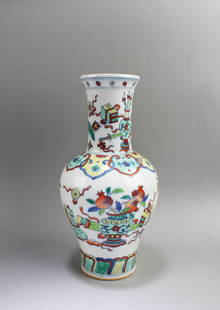 Chinese Porcelain Vase: Chinese Porcelain Vase. 'QianLong' mark at base. Height: 9.5"