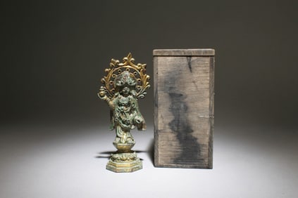 A Gilt-Bronze Standing Buddha