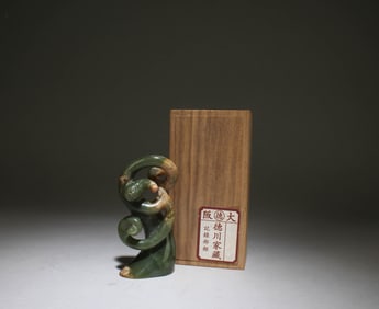 A Carved Jade Figure Ornament