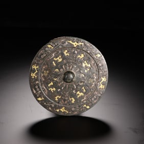 A Bronze Mirror With Gold and Silver Inlay