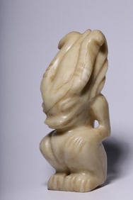 A Hongshan Culture White Jade Sun God Ornament