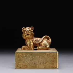A Gilt Bronze Seal With Floral Motif and Lion Knob