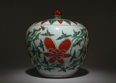 A Red and Green Jar with Lid
