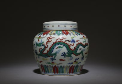 A Doucai Dragon Container with Lid