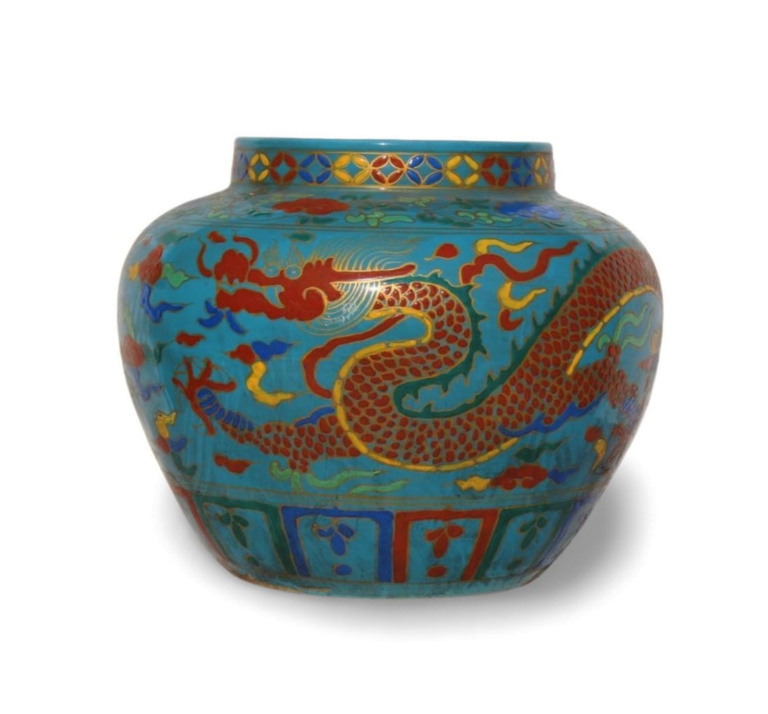 A Porcelain Dragon Jar: A Porcelain Dragon Jar . Dimension: 11" x 13".