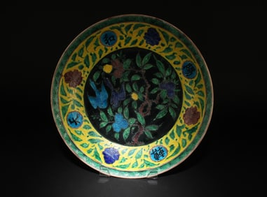 A Polychrome Porcelain Charger