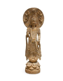 A Carved Stone Standing Buddha Statue