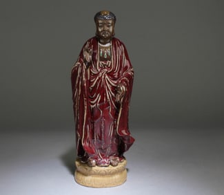 A Chinese Ox-Blood Red Glazed Statue
