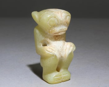 A Chinese Celedon Jade Stone Figure