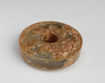 A Round Carved Jade Ornament