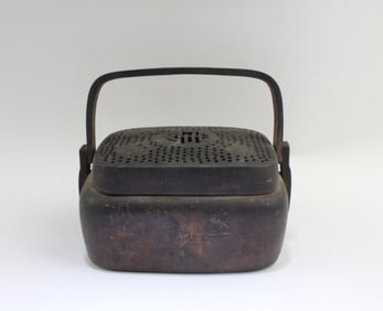 A Bronze Hand Warmer