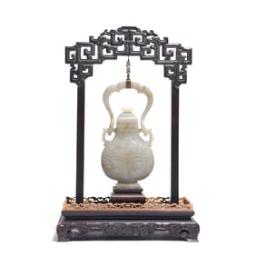 A White Jade Beast-Mask Swing-Handled Vessel